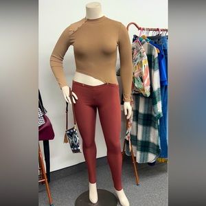 Body suit with cut out